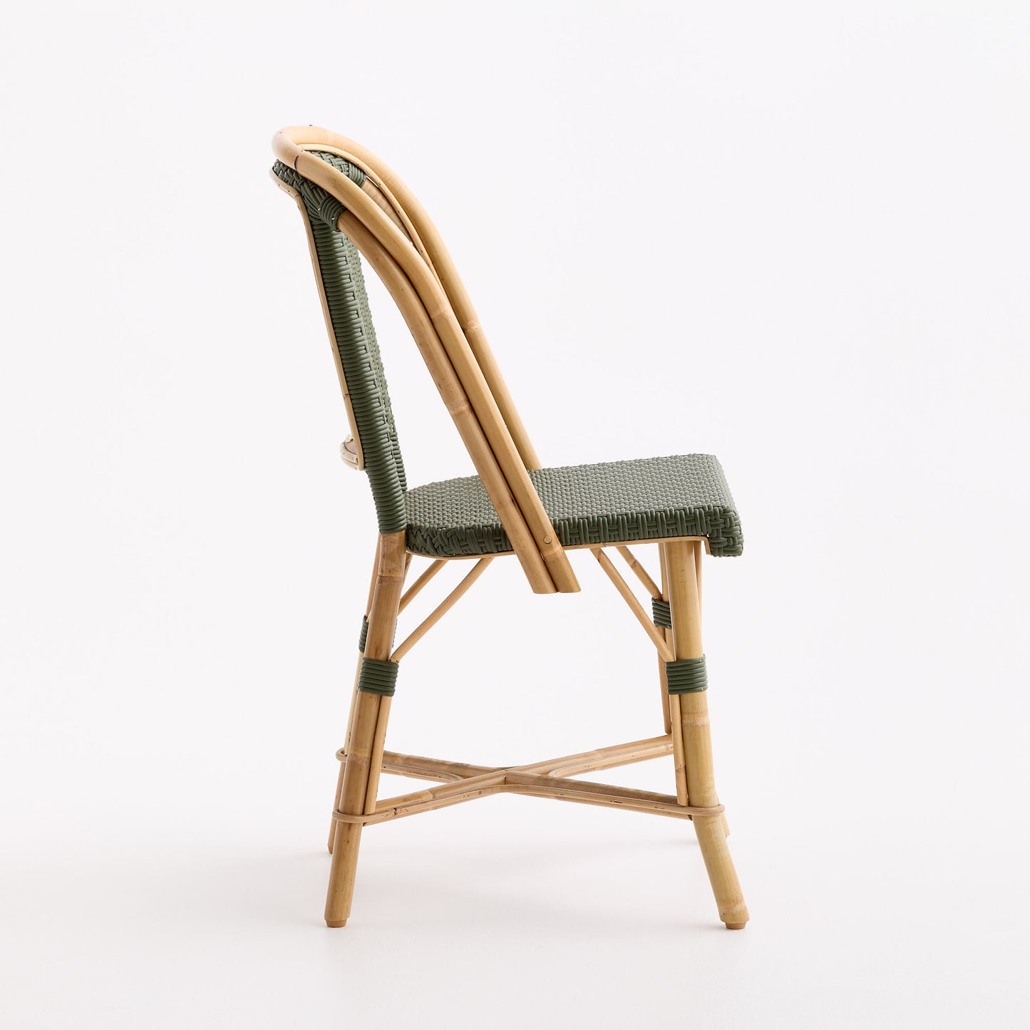 Olive green woven rattan bistro chair with a natural wooden frame, side profile view on a white background.