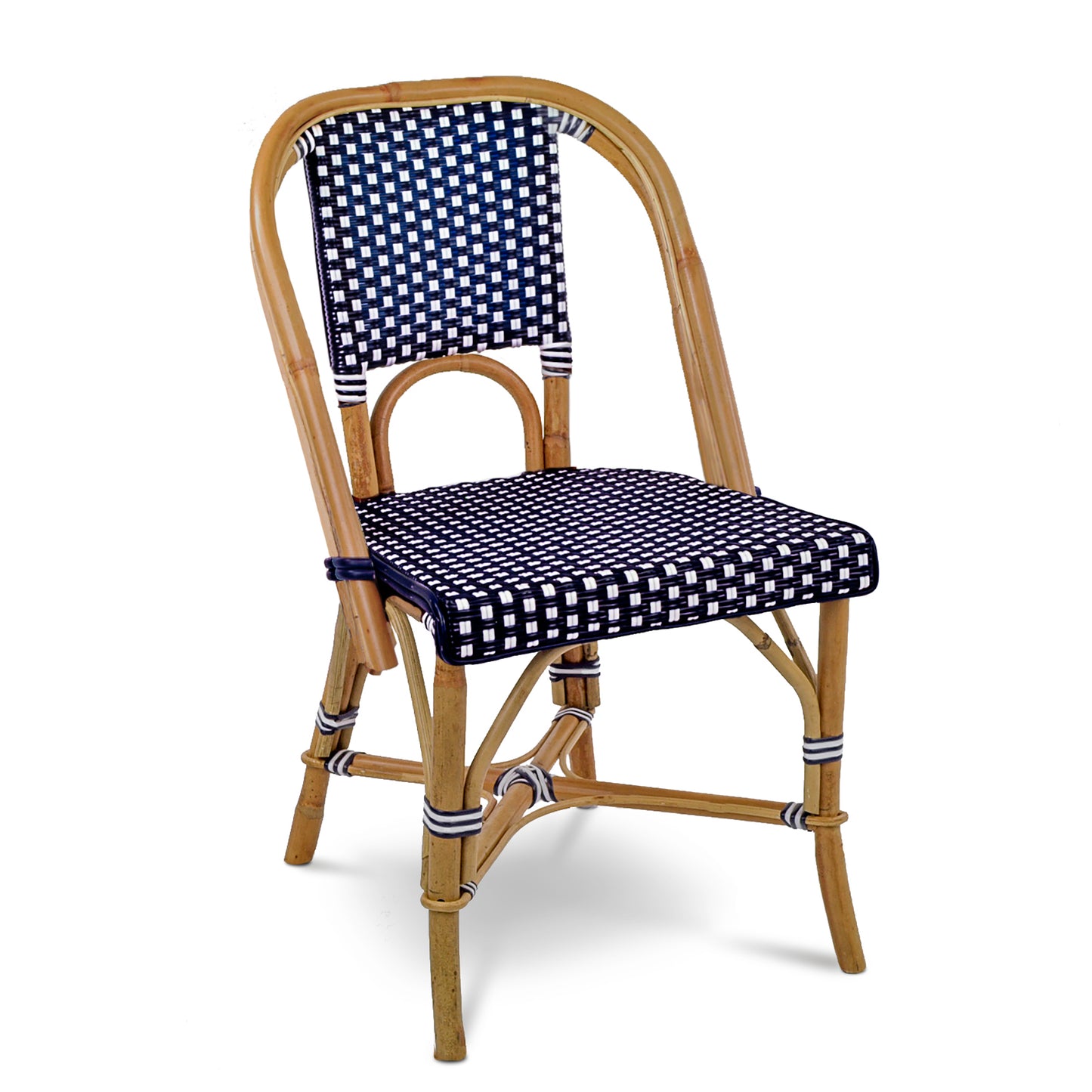 Rattan bistro chair with navy blue and white spotted woven seat and back.
