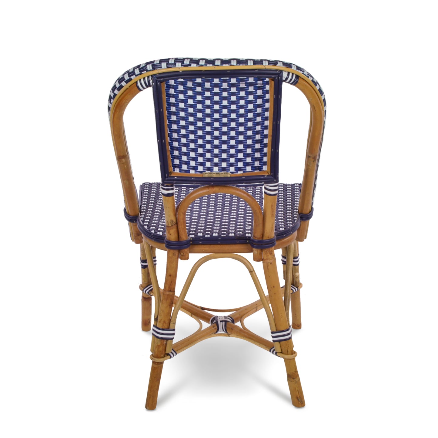 Rattan bistro chair with navy blue and white spotted woven seat and back, natural wood frame.