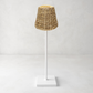 Natural rattan woven lamp shade, 4.5"Dia x 4.5"H, on a white lamp base.