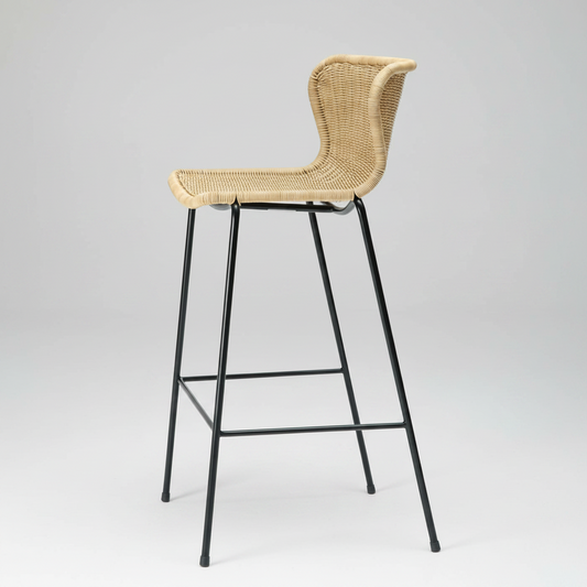 Rattan "Wing" Indoor Counter Stool with natural wicker seat and black powder-coated steel frame.