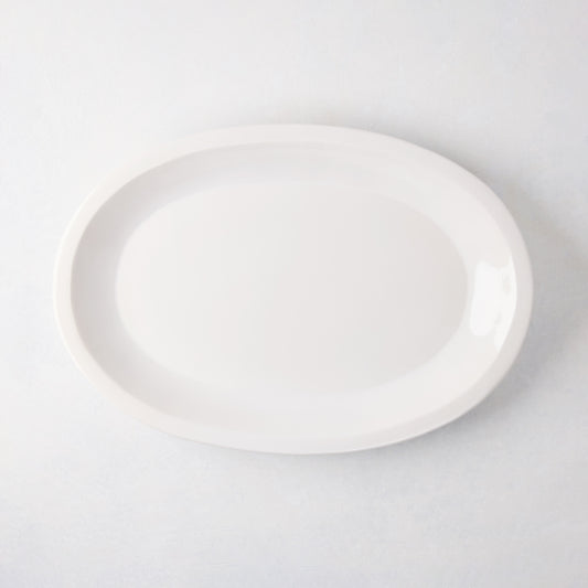 White Ravello Small Oval Stoneware Serving Platter with raised edge, 18.3"L x 12.8"W.