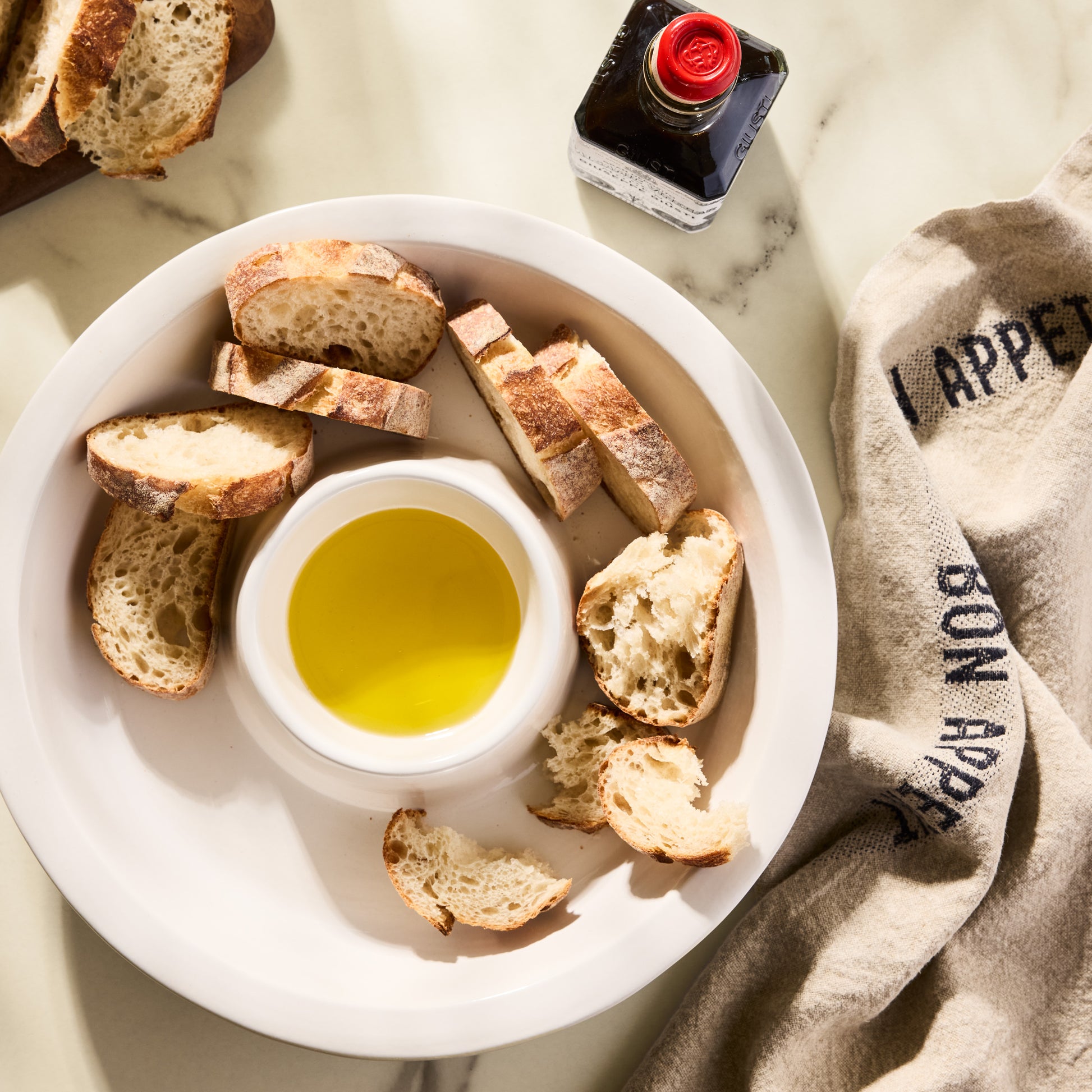White stoneware Ravello chip and dip platter with olive oil and sliced bread, 13"Dia.