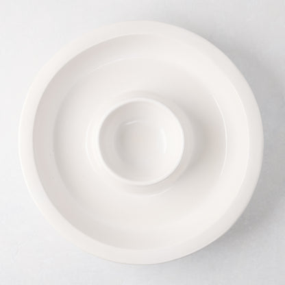 Ravello white stoneware chip and dip platter with built-in dipping bowl, 13" diameter.
