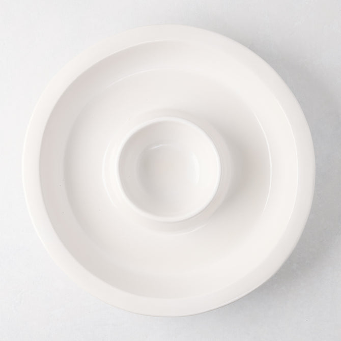 Ravello white stoneware chip and dip platter with built-in dipping bowl, 13" diameter.