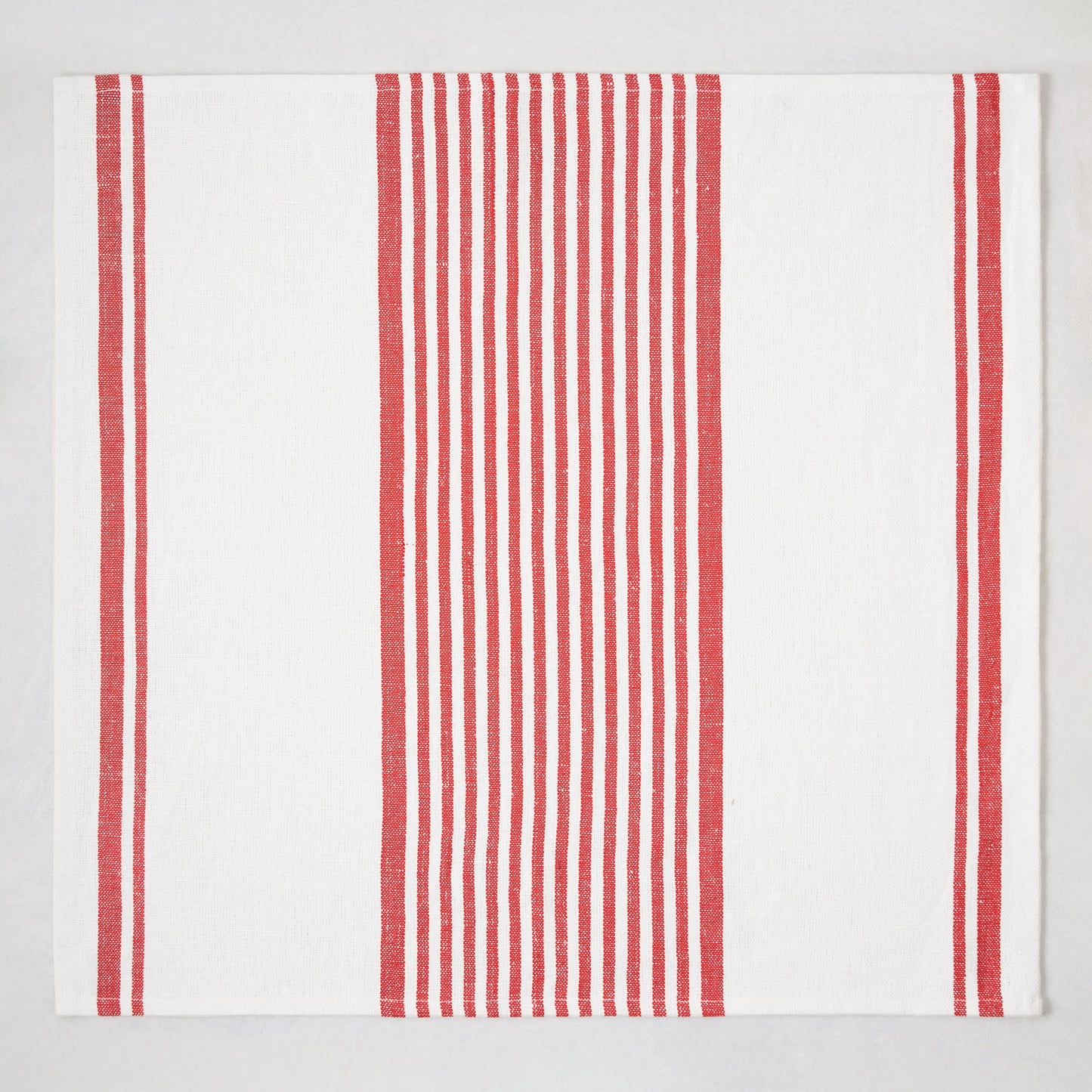 Red Boat Stripe Napkin, 22" square, ivory cotton-linen with vertical red stripes.