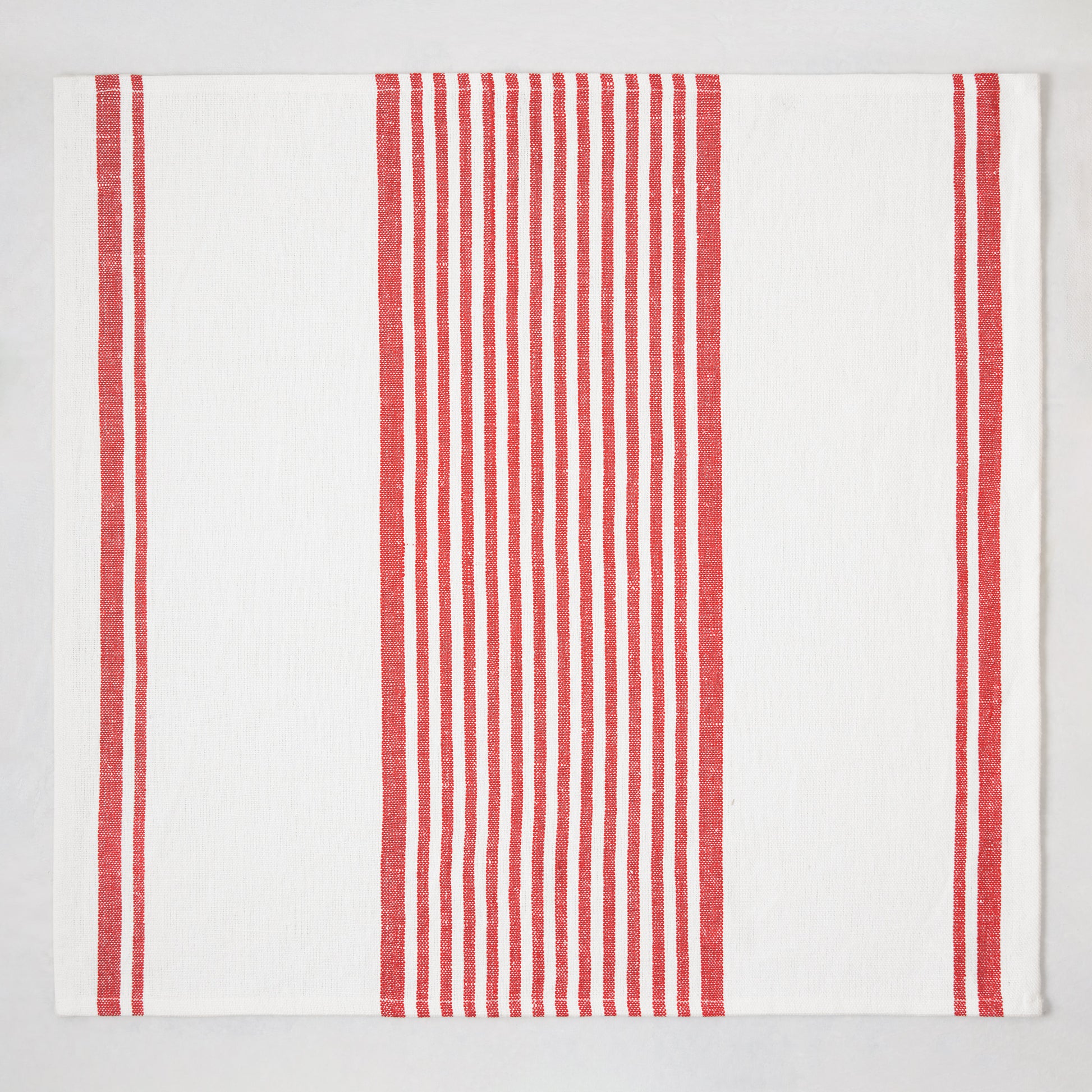 Red Boat Stripe Napkin, 22" square, ivory cotton-linen with vertical red stripes.