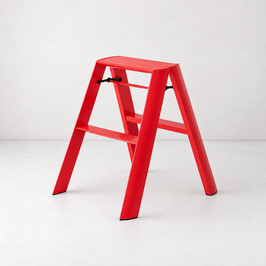Red Hasegawa Lucano 2-step ladder in matte red aluminum and steel with a safety latch and grooved treads.