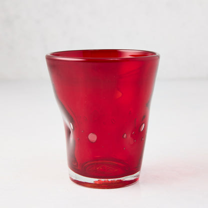 Red Henri mouth-blown glass, 8 oz, with unique imperfections and air bubbles.