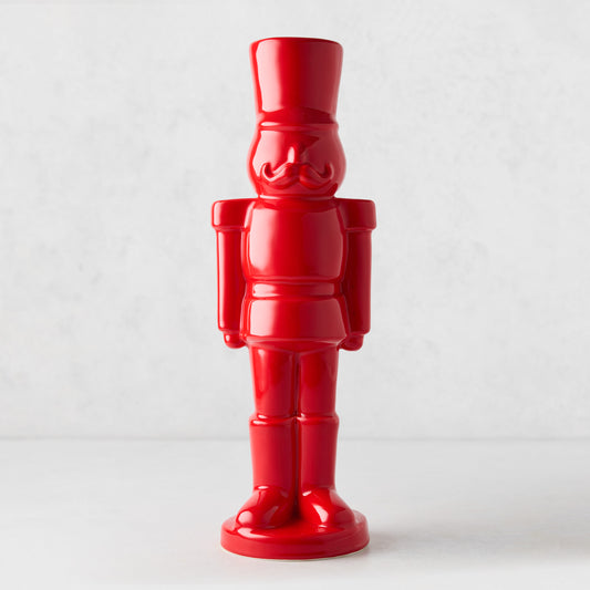 Luigi ceramic nutcracker figurine in a glossy solid red finish with a minimalist soldier design.