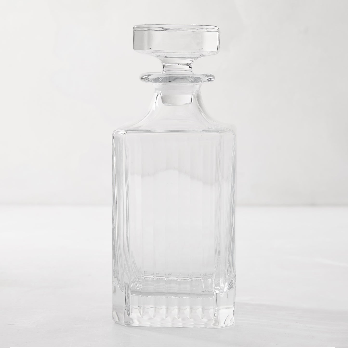 Regent Eco-Crystal Decanter, clear lead-free crystal with vertical fluting and stopper.