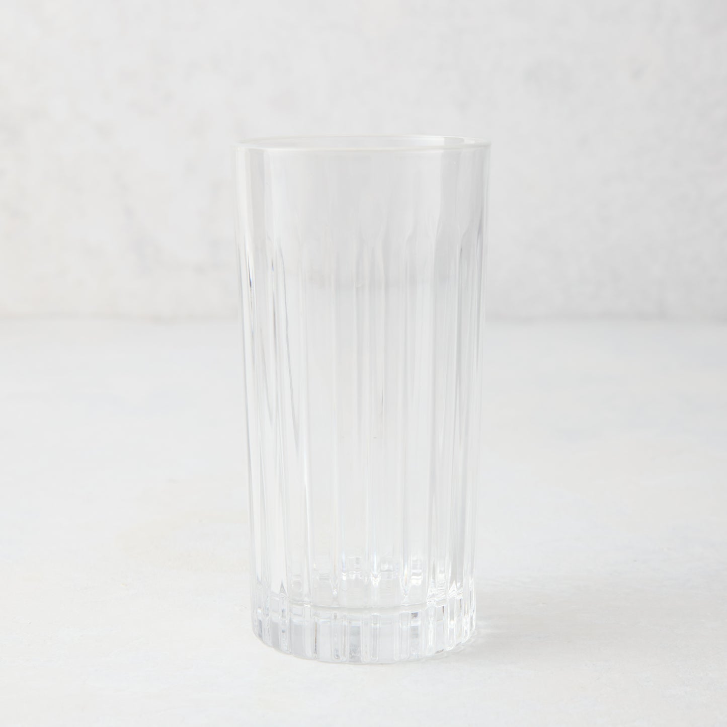 Regent Eco-Crystal High Ball Glass, clear lead-free crystal, 6"H, with vertical ridges.