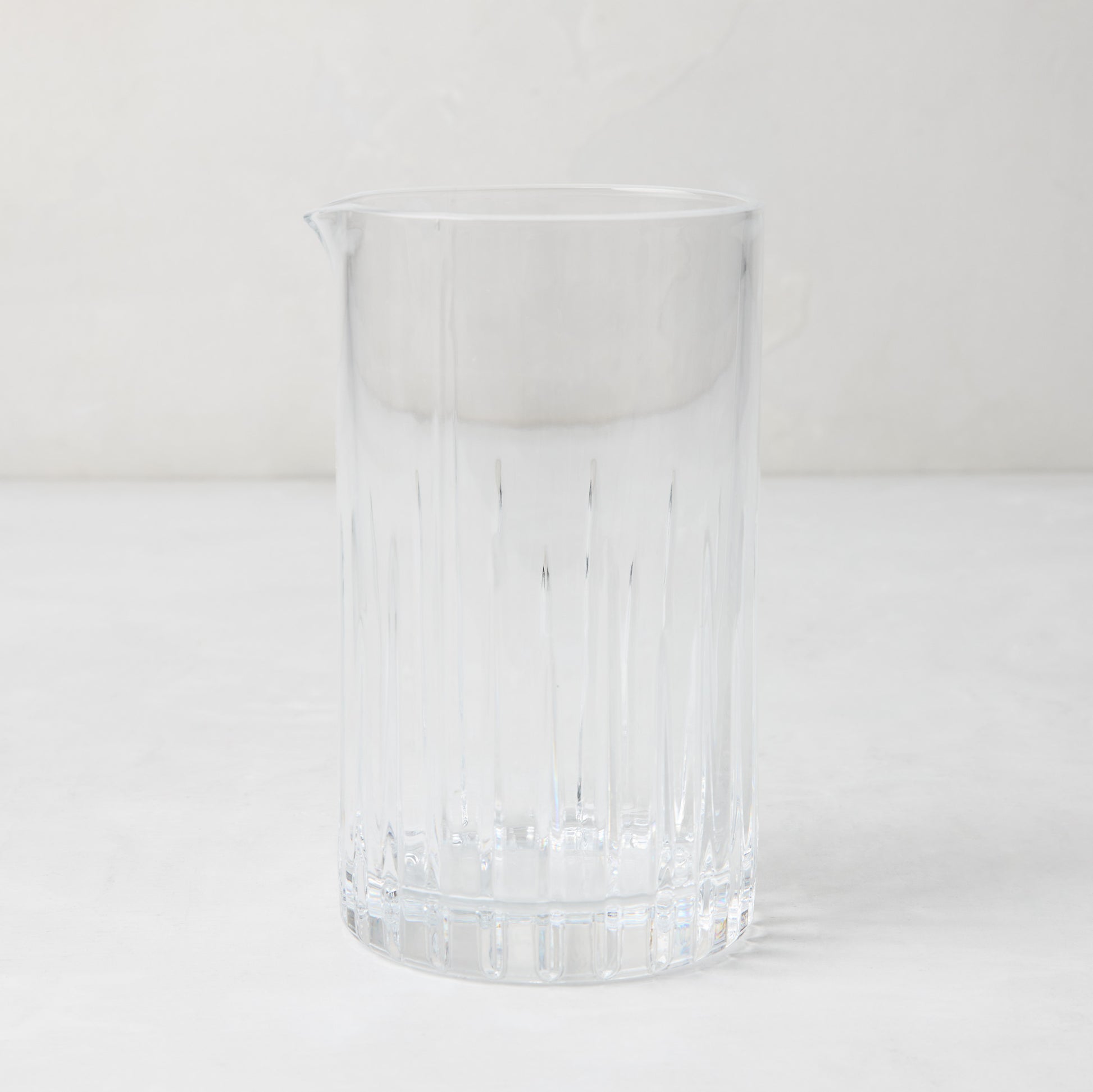 Regent Eco-Crystal Mixing Glass, clear lead-free crystal with vertical ribbed design and pour spout.