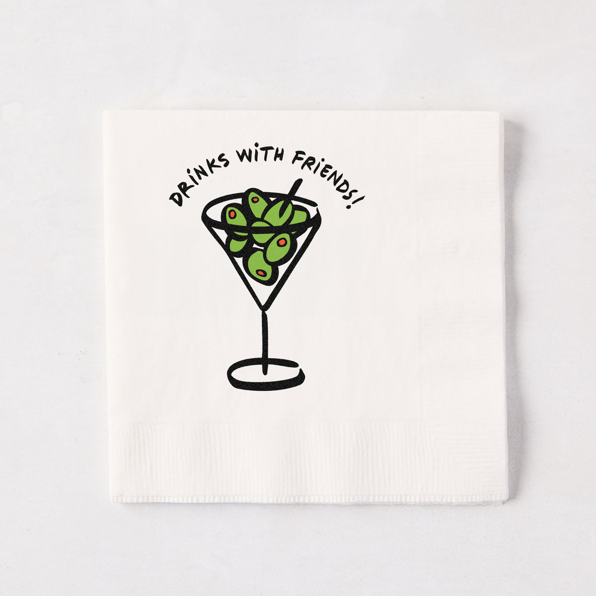 White 3-ply paper cocktail napkin with a hand-drawn martini glass illustration and Drinks with Friends text.