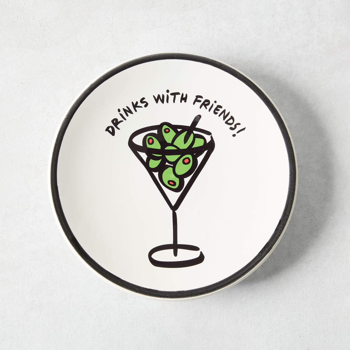White ceramic appetizer plate with a hand-painted martini glass, green olives, and Drinks with Friends text, black rim.
