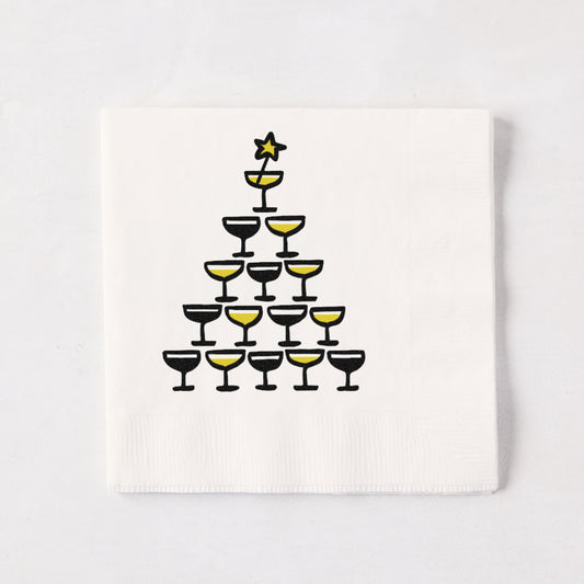 White 3-ply paper cocktail napkin with a black and yellow hand-drawn champagne tower illustration by Rob Wilson.
