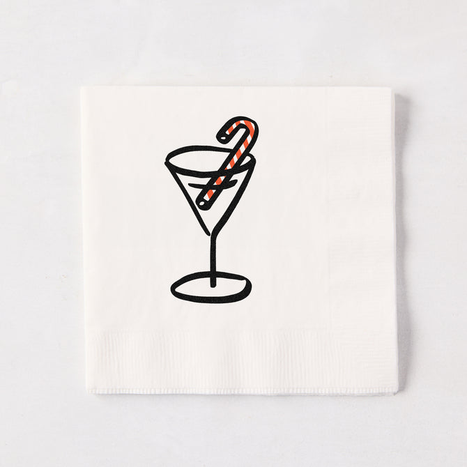 White 5.5-inch 3-ply paper cocktail napkin with a black line-drawn martini glass and red-striped candy cane illustration.