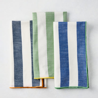 Rockport Navy Blue Stripe Cotton Napkin with Orange Trim, folded, 22" square.