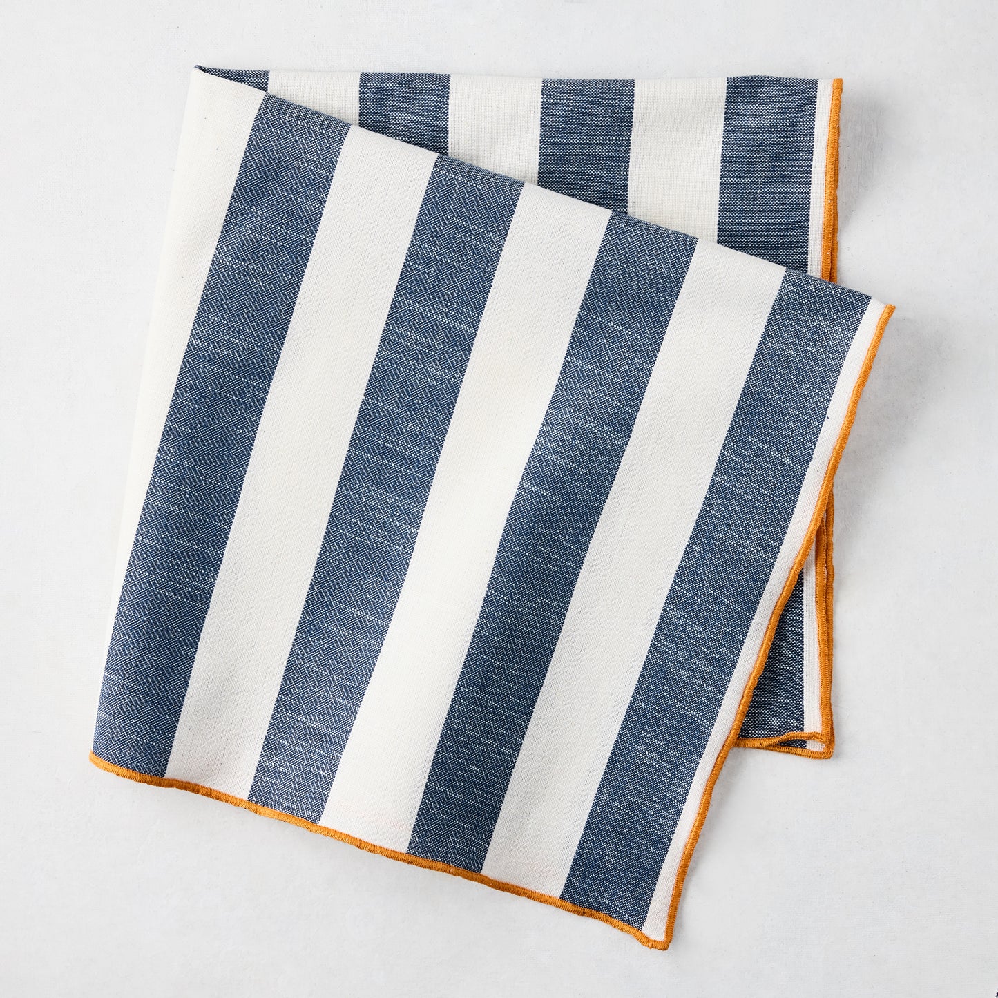 Rockport Navy Blue Stripe Cotton Napkin with Orange Trim, 22" Square.