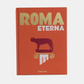 Orange hardcover "Roma Eterna" book with gold title, red Capitoline Wolf, and white column design.