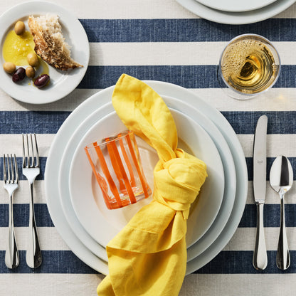 Roma Hotel silverplate 5-piece flatware set with elegant, polished finish on a striped table setting.