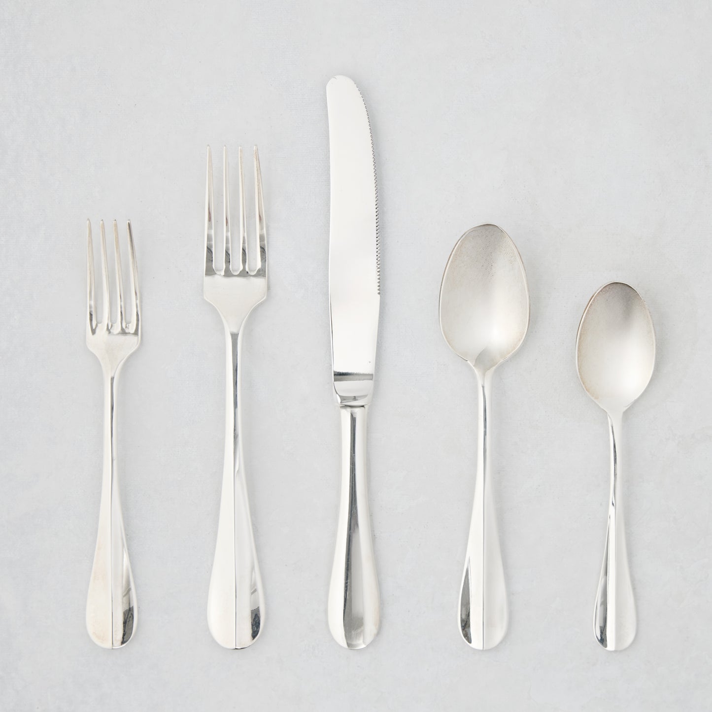 Roma Hotel silverplate 5-piece flatware set with Neo-Baroque style, including forks, knife, and spoons.