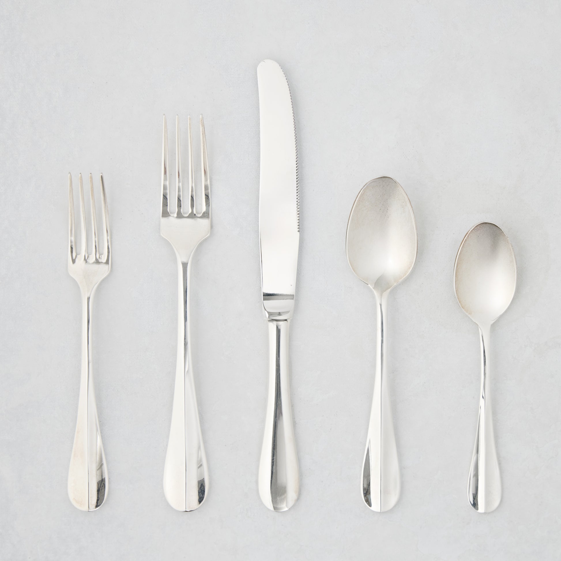Roma Hotel silverplate 5-piece flatware set with Neo-Baroque style, including forks, knife, and spoons.