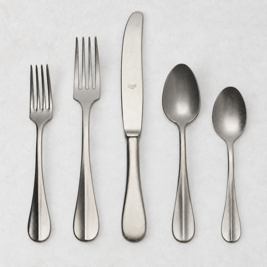 Roma Vintage 5-piece stainless steel flatware set with a matte finish, featuring a neo-baroque design on a white background.