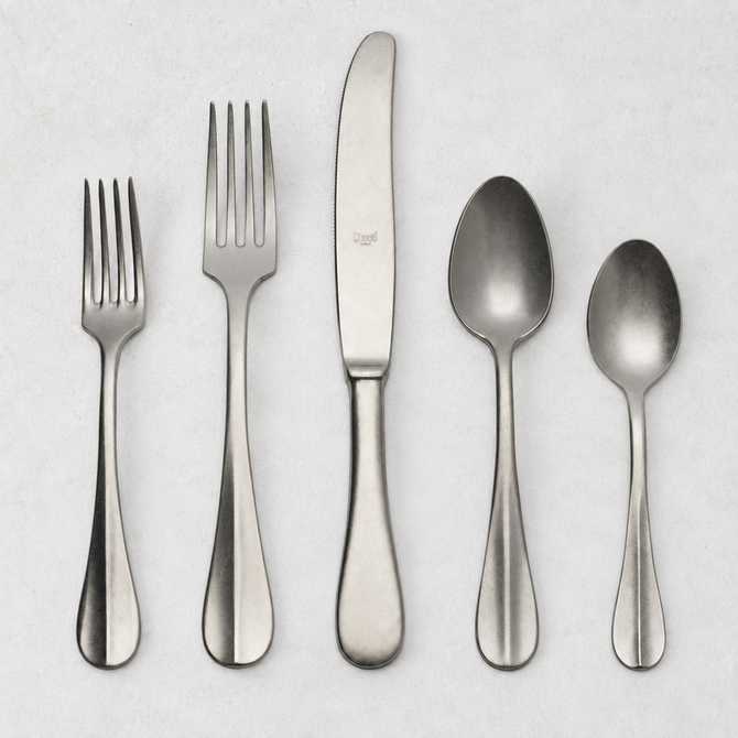 Roma Vintage 5-piece stainless steel flatware set with a matte finish, featuring a neo-baroque design on a white background.