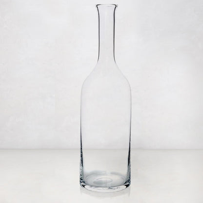 Clear, tall Romeo Scissor-Cut mouth-blown glass wine carafe with a narrow neck and wide base.
