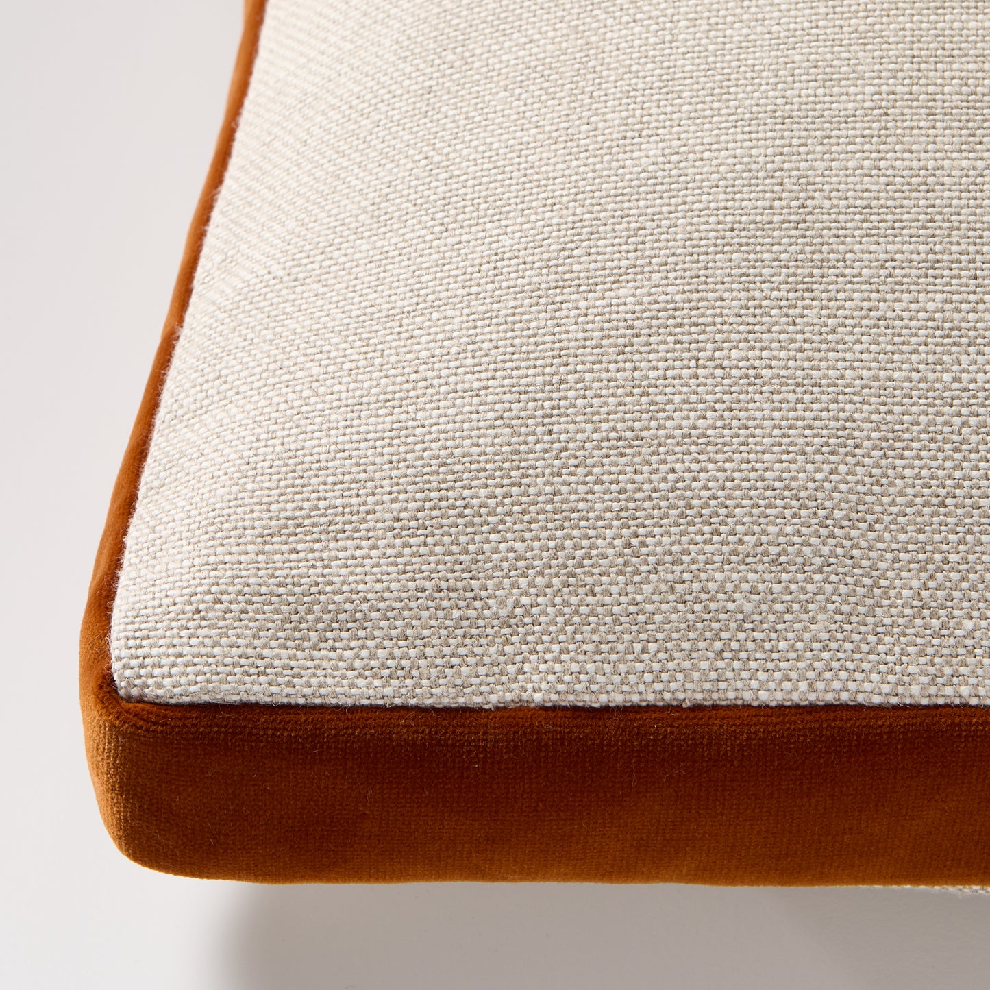 Rust orange velvet gusseted and flax linen lumbar pillow, 20"L x 14"H, with hidden zipper.