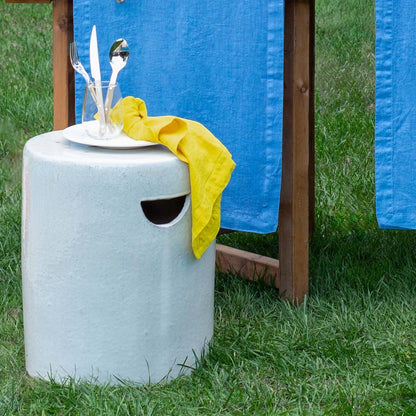 Rustic white ceramic cylinder garden stool with a unique handle cutout, 16.25"Dia x 20"H.