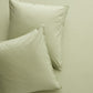 Two sage green Italian percale Euro shams with envelope closures, soft and crisp.