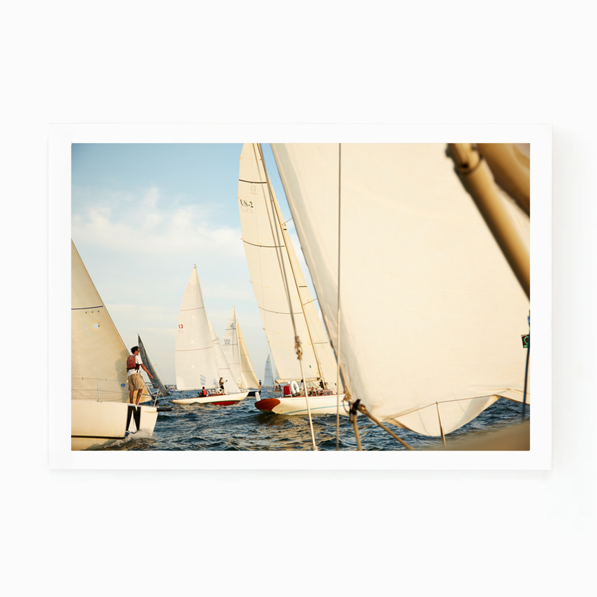 Matt Albiani's "Sailboats" photograph: white sailboats on blue water under a clear sky.