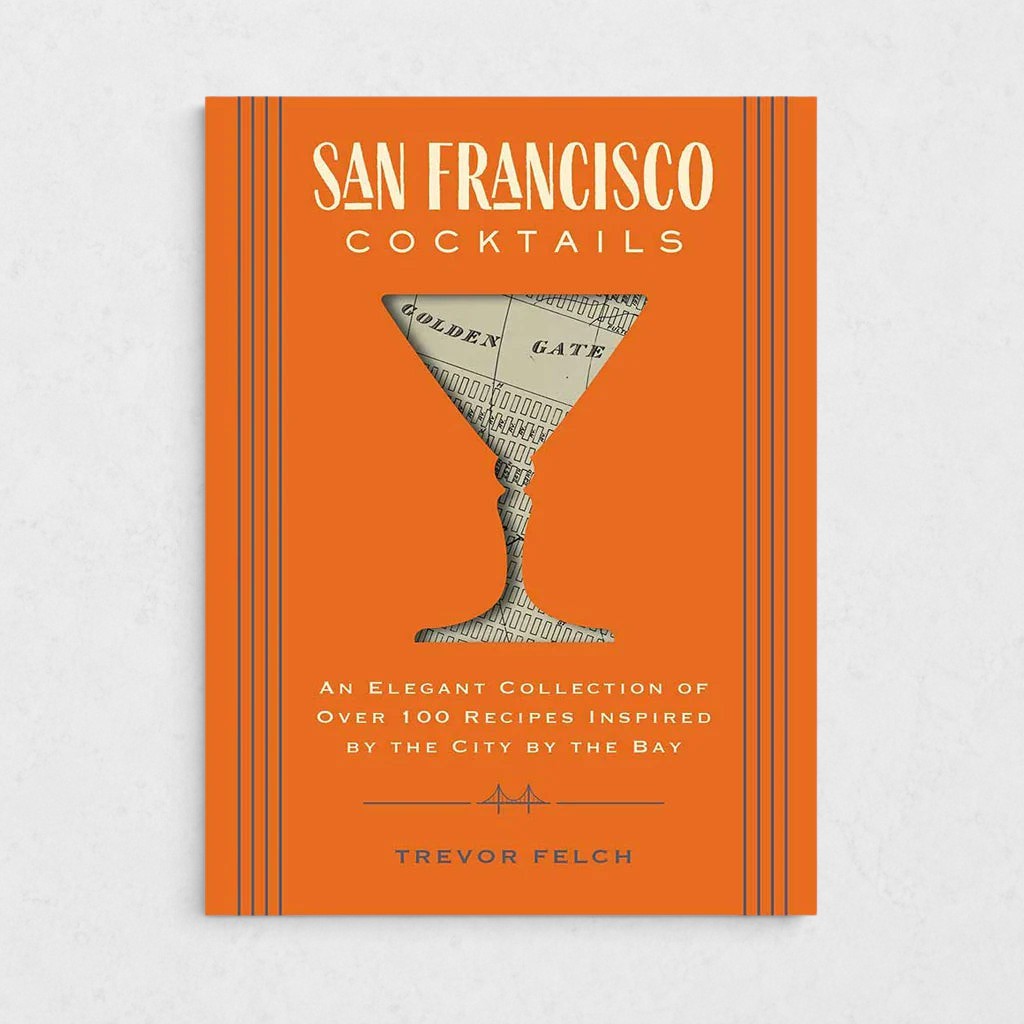 Orange San Francisco Cocktails book with a martini glass silhouette revealing a map of the Golden Gate.