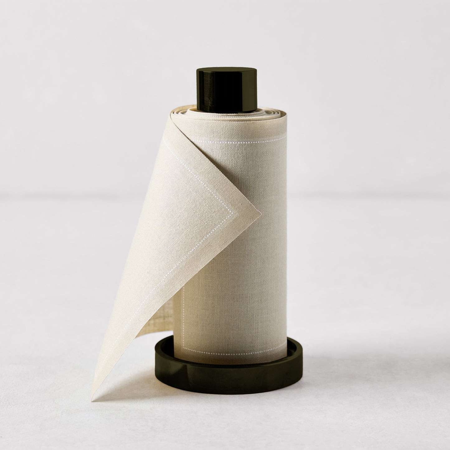 Sand tear-off cotton napkins in a black metal holder, 5"H.