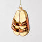 Hand-painted glass and resin sandal ornament in metallic bronze and glittery tan with gold buckles.