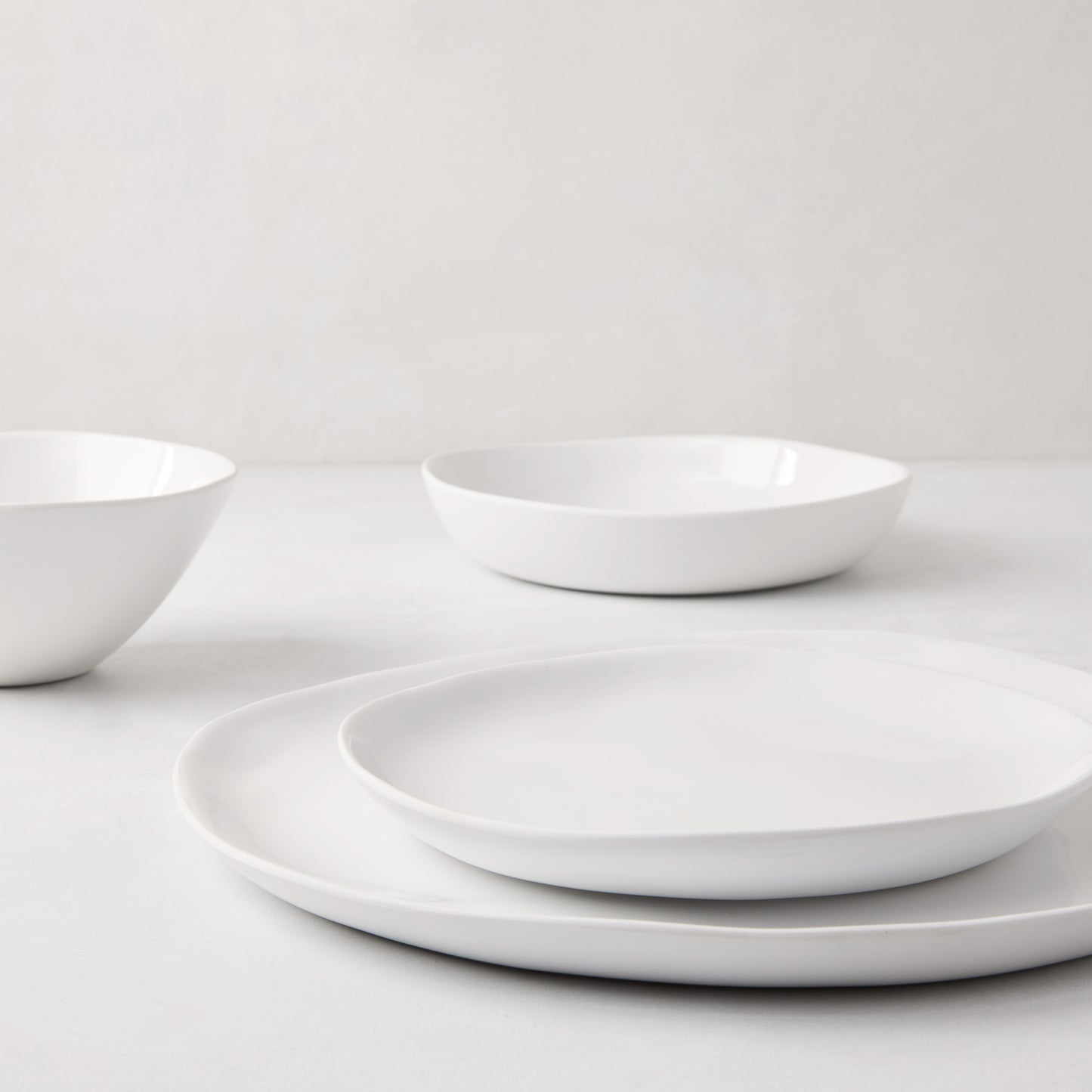 Sandia White Outdoor Melamine Salad Plate, 7.75" diameter, with a matte exterior and glossy interior.
