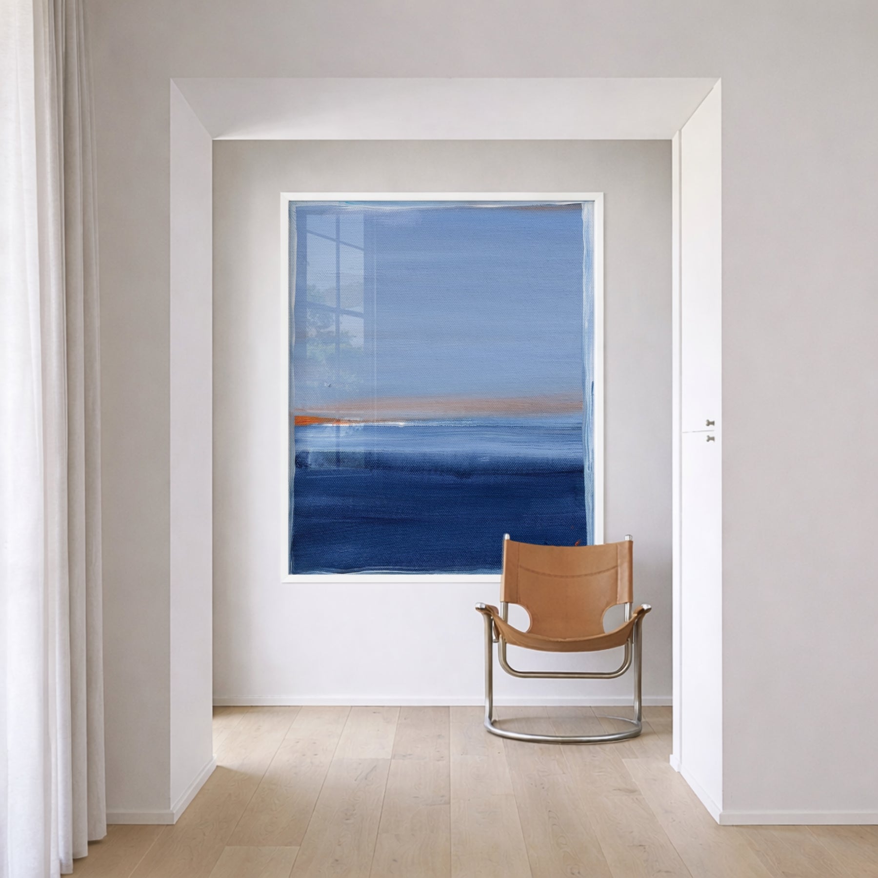 Santorini Sunset art print by Kerri Rosenthal, framed in white, featuring blue and orange abstract seascape.