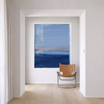 Santorini Sunset art print by Kerri Rosenthal, framed in white, featuring blue and orange abstract seascape.