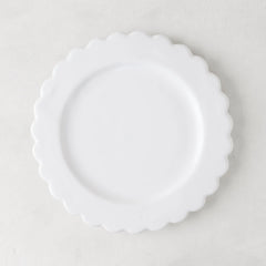 White ceramic scalloped salad plate, 8.75" diameter, on a light background.
