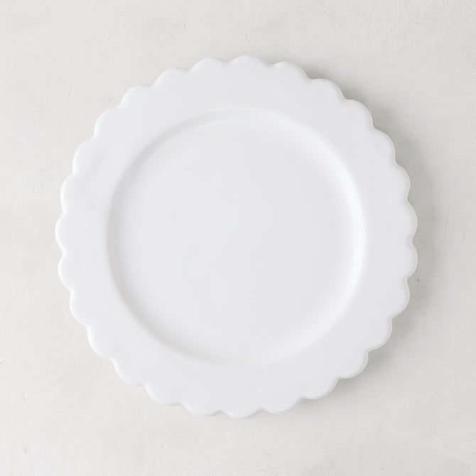 White ceramic scalloped salad plate, 8.75" diameter, on a light background.