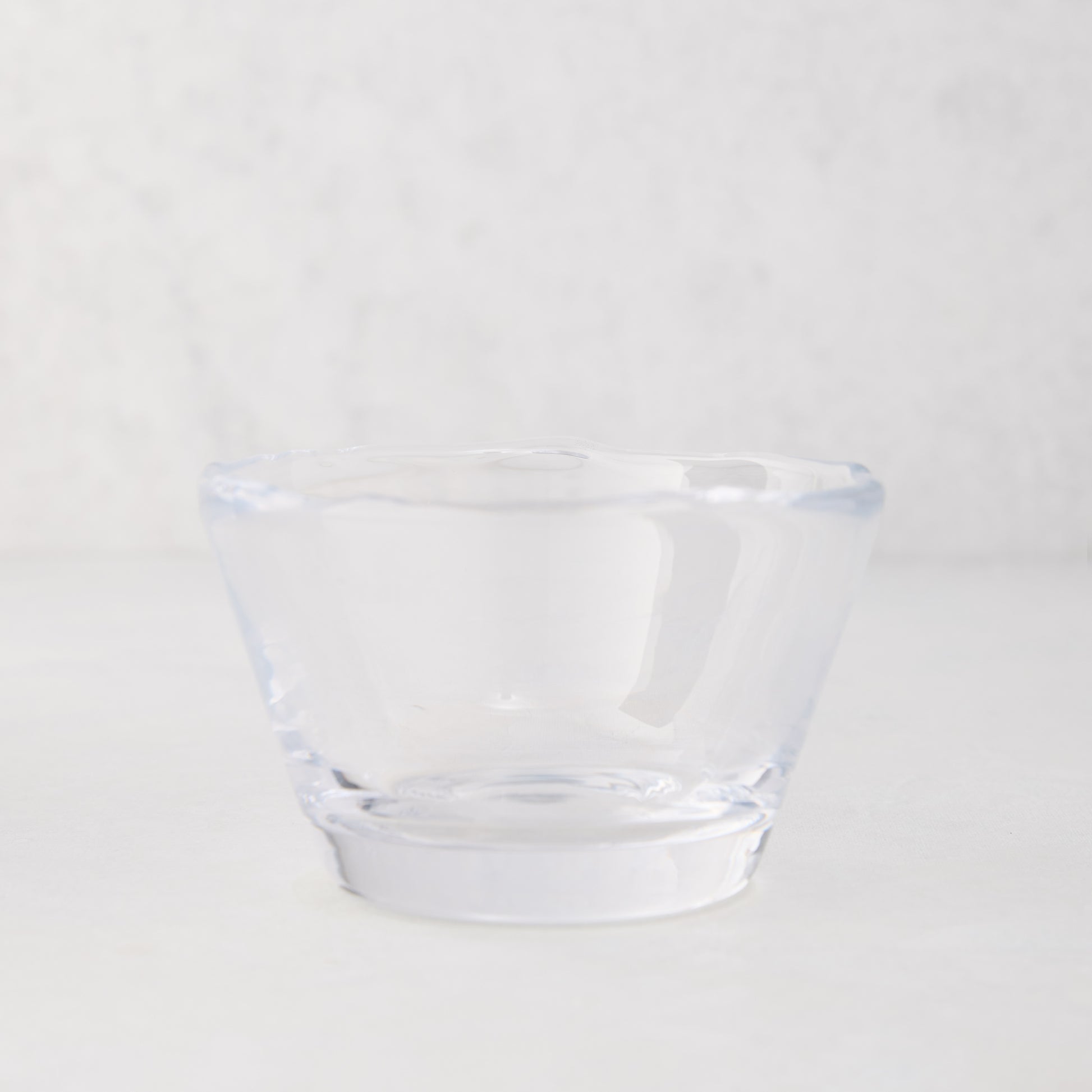 Clear glass breakfast bowl with a unique scissor-cut top, 5" Dia x 3"H.