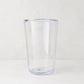 Clear acrylic Seadrift highball glass with a subtle blue rim and base, 19oz.