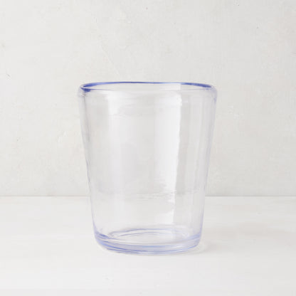 Clear acrylic Seadrift Old Fashioned glass with a subtle blue rim, inspired by Mexican glassware.