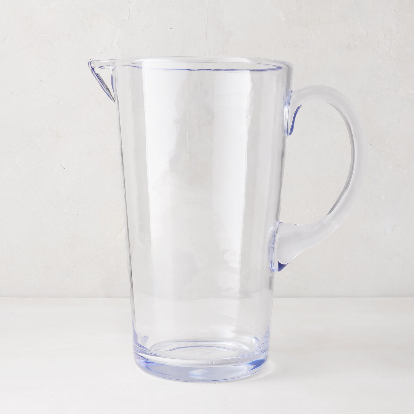 Clear Acrylic Seadrift Pitcher, 70oz, with handle and spout, on a white background.