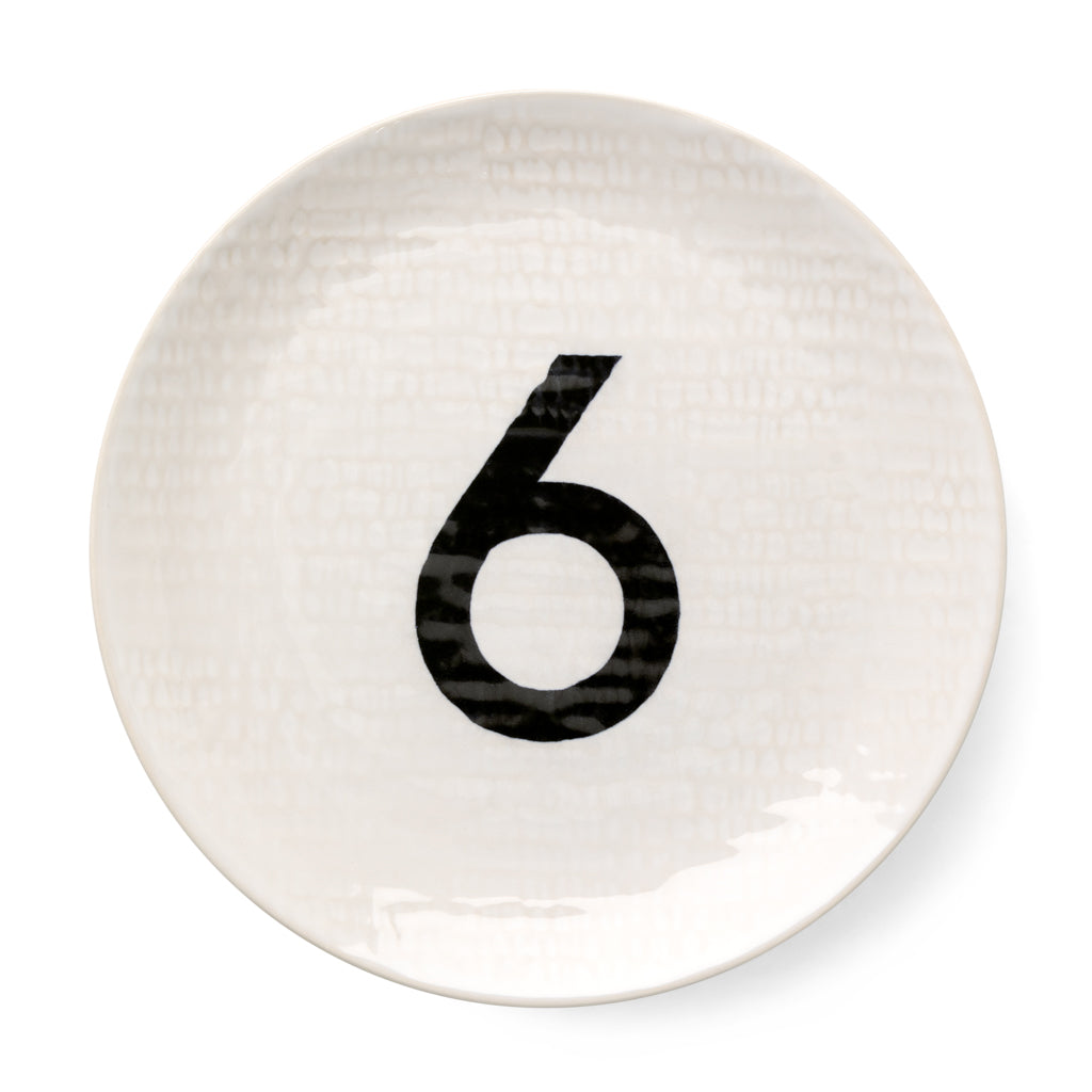 Cream ceramic salad plate with hammered finish and black number 6.