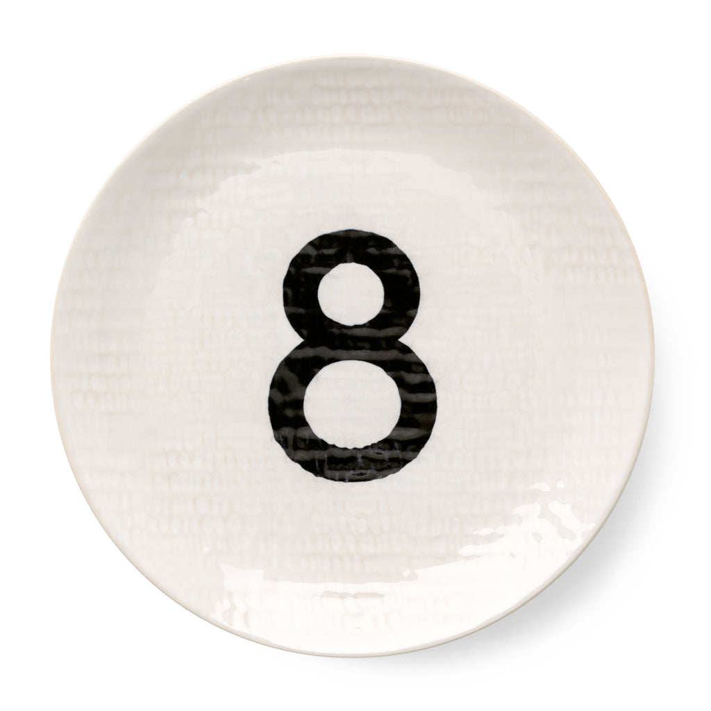 Cream ceramic salad plate with hammered finish and black number 8, 8.5" diameter.