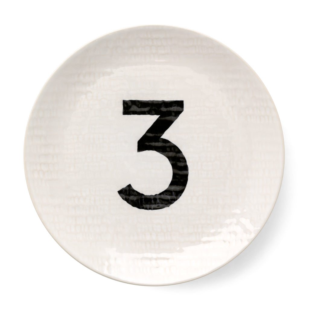 Cream ceramic salad plate with hammered finish and black number 3.