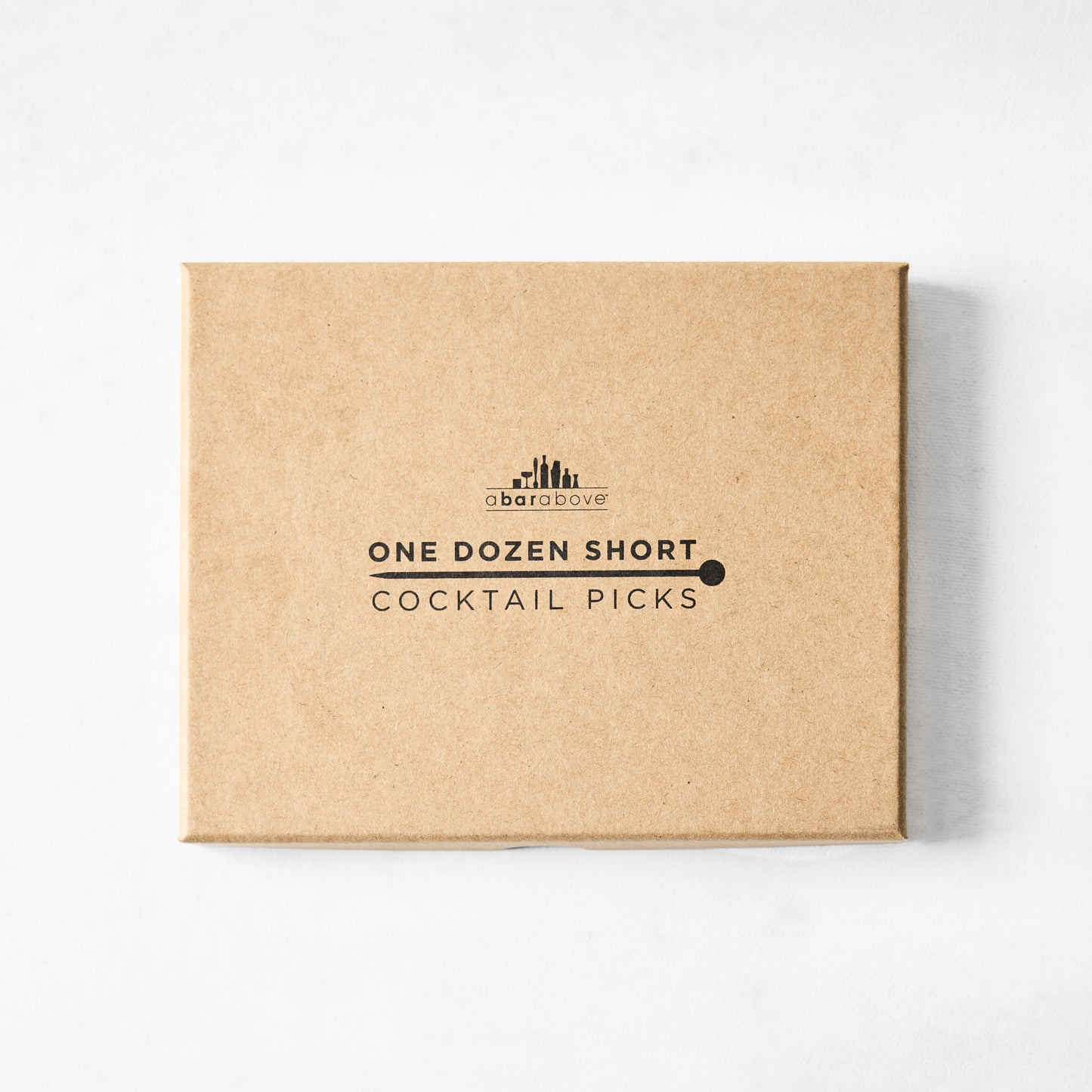 Brown cardboard box for "One Dozen Short Cocktail Picks" by A Bar Above, with black text and logo.